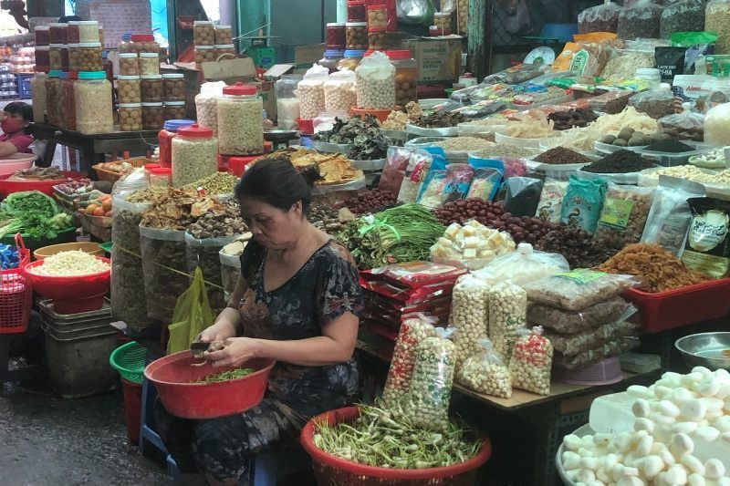 immagini dei commercianti in cholon